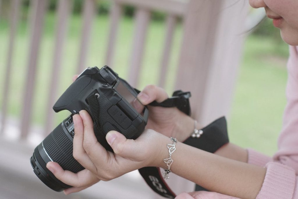 lady holding camera
