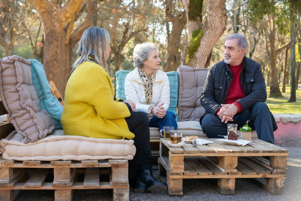 people using pallets as garden furniture